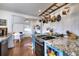 Kitchen featuring stone countertops, stainless steel appliances, and an eat-in breakfast area at 309 W Bond St., Marion, SC 29571