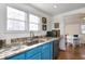 Kitchen featuring stone countertops, stainless steel appliances, and an eat-in breakfast area at 309 W Bond St., Marion, SC 29571