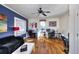 Spacious living room offering hardwood floors, a ceiling fan, and natural light at 309 W Bond St., Marion, SC 29571