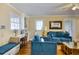 Comfortable living room with desk area, bench seating, and natural light at 309 W Bond St., Marion, SC 29571