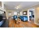 Spacious living room with hardwood floors, bright sofas, and comfortable seating at 309 W Bond St., Marion, SC 29571