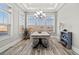 Dining room with large windows, allowing plenty of natural light and a view of the outdoors at 3120 Moss Bridge Ln., Myrtle Beach, SC 29579