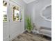 Charming foyer featuring light gray walls, a modern wood-look floor, and views from the front door at 3304 Palm St., North Myrtle Beach, SC 29582