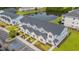 Aerial view of new townhomes with pond and accessible parking spaces at 344 Kiskadee Loop # A, Conway, SC 29526