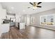 Spacious kitchen area features stainless steel appliances, a large island and a hardwood floor at 344 Kiskadee Loop # A, Conway, SC 29526
