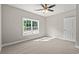 Bedroom with large window and carpet flooring at 344 Kiskadee Loop # B, Conway, SC 29526