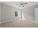 Bedroom with carpet, window, and ceiling fan at 344 Kiskadee Loop # C, Conway, SC 29526
