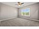 Bright bedroom with plush carpet, and window at 344 Kiskadee Loop # C, Conway, SC 29526