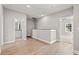 Bonus room with wood flooring, bathroom access, and abundant natural light at 344 Kiskadee Loop # C, Conway, SC 29526
