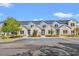 New townhomes feature light brick, blue siding, and black roofs at 344 Kiskadee Loop # C, Conway, SC 29526