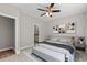 Bedroom with ceiling fan and view to bathroom at 344 Kiskadee Loop # C, Conway, SC 29526