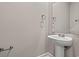 Modern powder room with pedestal sink and neutral paint at 344 Kiskadee Loop # C, Conway, SC 29526
