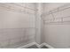 Spacious walk-in closet with built-in white shelving units at 344 Kiskadee Loop # C, Conway, SC 29526