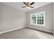 Carpeted bedroom with large window at 344 Kiskadee Loop # D, Conway, SC 29526