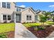 Charming two-story home with light brick and blue siding, complemented by a well-maintained lawn at 344 Kiskadee Loop # D, Conway, SC 29526