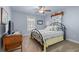Comfortable bedroom with a ceiling fan, a window, and an antique dresser at 3516 Queens Harbour Blvd., Myrtle Beach, SC 29588