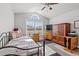 Bedroom features a daybed, vaulted ceiling with fan, and a large window for natural light at 3516 Queens Harbour Blvd., Myrtle Beach, SC 29588