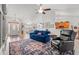 Cozy living room with vaulted ceilings and elegant furnishings, flowing into dining area at 3516 Queens Harbour Blvd., Myrtle Beach, SC 29588