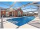 Pool with screened enclosure offers privacy and relaxation in a backyard retreat at 3516 Queens Harbour Blvd., Myrtle Beach, SC 29588