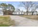Shot of exterior and expansive driveway, ideal for parking and outdoor activities at 3530 Reavis Ln., Myrtle Beach, SC 29579