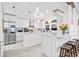 Bright kitchen featuring white cabinets, marble countertops, and stainless steel appliances at 3530 Reavis Ln., Myrtle Beach, SC 29579