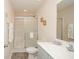 Bathroom with walk-in shower and vanity with modern faucet at 3952 Murrells Inlet Rd., Murrells Inlet, SC 29576