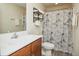 Full bathroom featuring a wood vanity, shower, and neutral walls at 3952 Murrells Inlet Rd., Murrells Inlet, SC 29576