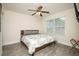 Cozy bedroom with a ceiling fan, a window and neutral walls at 3952 Murrells Inlet Rd., Murrells Inlet, SC 29576
