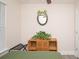 Bedroom with a rattan console table and a plant at 3952 Murrells Inlet Rd., Murrells Inlet, SC 29576
