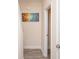 Hallway with durable vinyl flooring, and an adjacent open doorway at 3952 Murrells Inlet Rd., Murrells Inlet, SC 29576