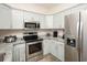 A beautifully appointed kitchen with stainless steel appliances and granite countertops offers modern convenience at 3952 Murrells Inlet Rd., Murrells Inlet, SC 29576