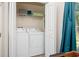 A convenient laundry closet with a washer and dryer for easy laundry days at 3952 Murrells Inlet Rd., Murrells Inlet, SC 29576