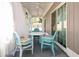 Covered porch featuring a table and chairs for outdoor seating at 3952 Murrells Inlet Rd., Murrells Inlet, SC 29576