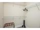 Walk-in closet with white wire shelving, rod and laminate floors at 3952 Murrells Inlet Rd., Murrells Inlet, SC 29576