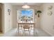 Charming dining area with a view to the water, ideal for enjoying meals with a serene backdrop at 3986 Lochview Dr., Myrtle Beach, SC 29588