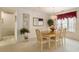 Inviting dining area featuring an elegant chandelier, seating for six, and tasteful decor at 3986 Lochview Dr., Myrtle Beach, SC 29588