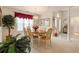 Inviting dining room featuring a chandelier, a table with seating for six, and a bright window at 3986 Lochview Dr., Myrtle Beach, SC 29588