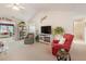Inviting living room offering comfortable seating, TV, and a seamless flow to other living spaces at 3986 Lochview Dr., Myrtle Beach, SC 29588