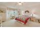 Tranquil bedroom with a cozy chair, soft natural light, and a comfortable king-sized bed at 3986 Lochview Dr., Myrtle Beach, SC 29588