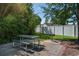 Outdoor picnic area with a grill and lush green surroundings at 3986 Lochview Dr., Myrtle Beach, SC 29588