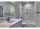 Modern bathroom features a combination shower and tub, and a quartz countertop at 4036 Bucolic Loop, Myrtle Beach, SC 29588
