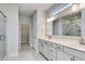 Elegant bathroom featuring double vanities, modern fixtures, and a glass-enclosed shower at 4036 Bucolic Loop, Myrtle Beach, SC 29588