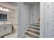 Hallway with a staircase leading to the next level and the bathroom at 4036 Bucolic Loop, Myrtle Beach, SC 29588