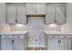 Well-lit kitchen with white cabinets, subway tile backsplash, and stainless steel hardware at 4036 Bucolic Loop, Myrtle Beach, SC 29588