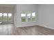 Spacious living room with ample windows providing natural light and scenic outdoor views at 4036 Bucolic Loop, Myrtle Beach, SC 29588