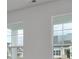 Bright living room features lots of windows that offers plenty of natural light and fresh air at 4036 Bucolic Loop, Myrtle Beach, SC 29588