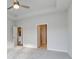 Spacious main bedroom showcasing a tray ceiling and access to bathroom and walk-in closet at 4036 Bucolic Loop, Myrtle Beach, SC 29588