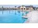 Large community pool featuring modern design, palm trees, and lounge chairs at 4036 Bucolic Loop, Myrtle Beach, SC 29588