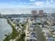 Stunning aerial view of waterfront homes and oceanfront high-rises along the tranquil canal at 409 36Th Ave. N, North Myrtle Beach, SC 29582