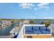 Inviting rooftop balcony with comfortable seating offering stunning views of the surrounding waterways and community at 409 36Th Ave. N, North Myrtle Beach, SC 29582